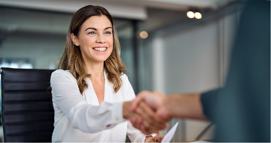 Woman shaking hands with lawyer