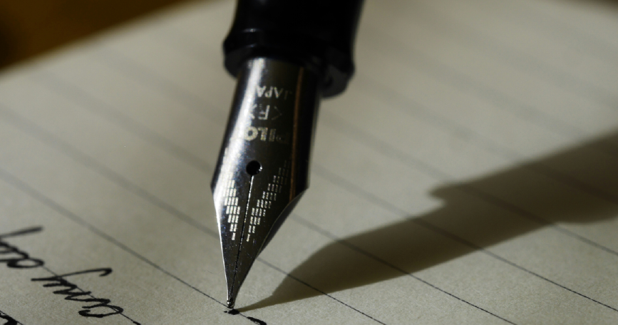 Signing an agreement with pen